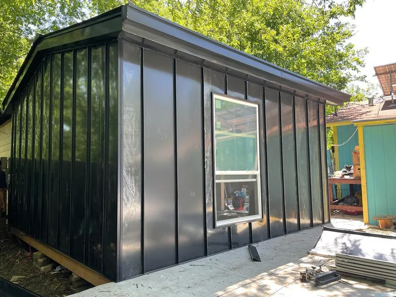 Black standing seam metal wall panels for Metal Roof Installation in Suffolk